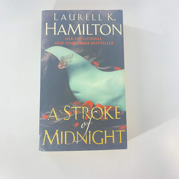 A Stroke of Midnight (Merry Gentry #4) by Laurell K. Hamilton